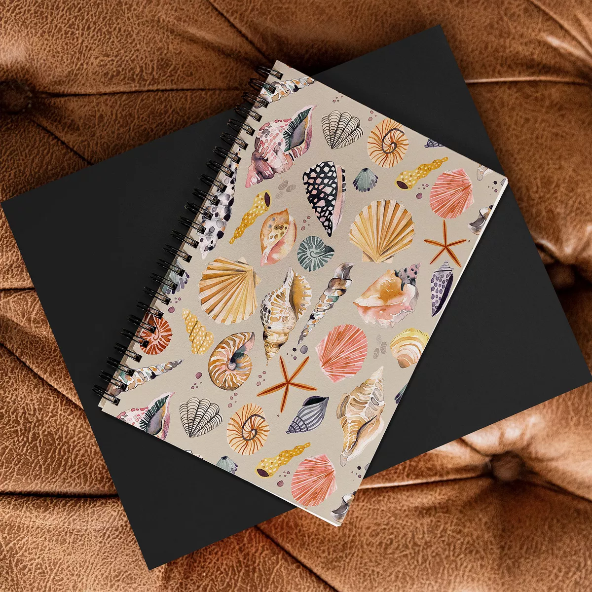 Ninola Design Sea Shells Sand Beige Spiral Notebook - Deny Designs