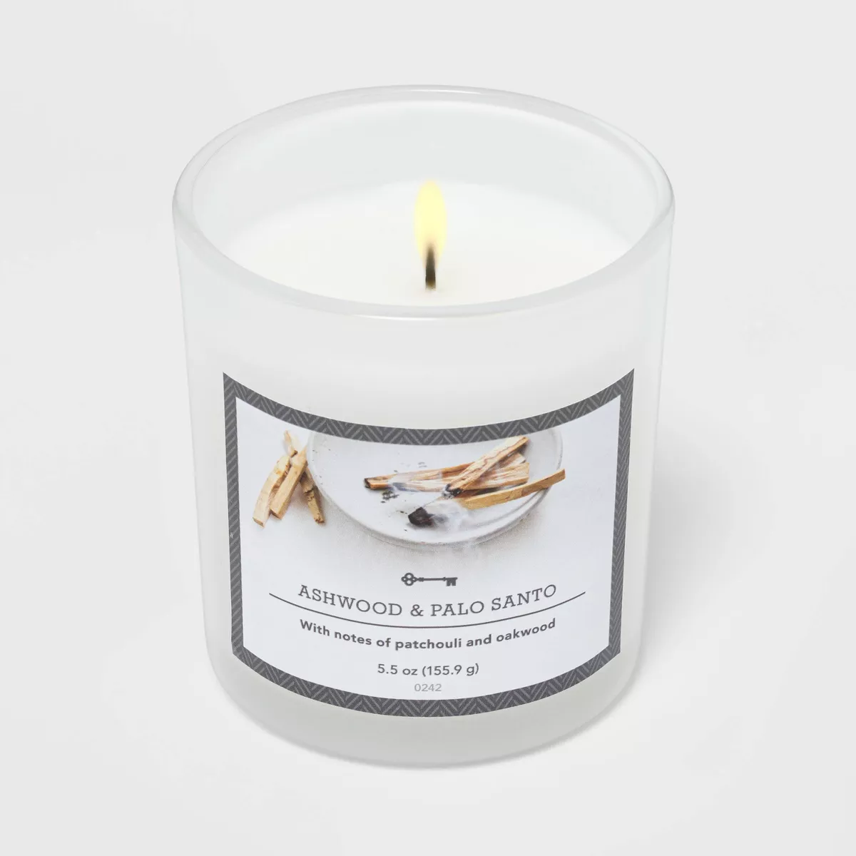 5.5oz Glass Jar Ashwood and Palo Santo Candle - Threshold™