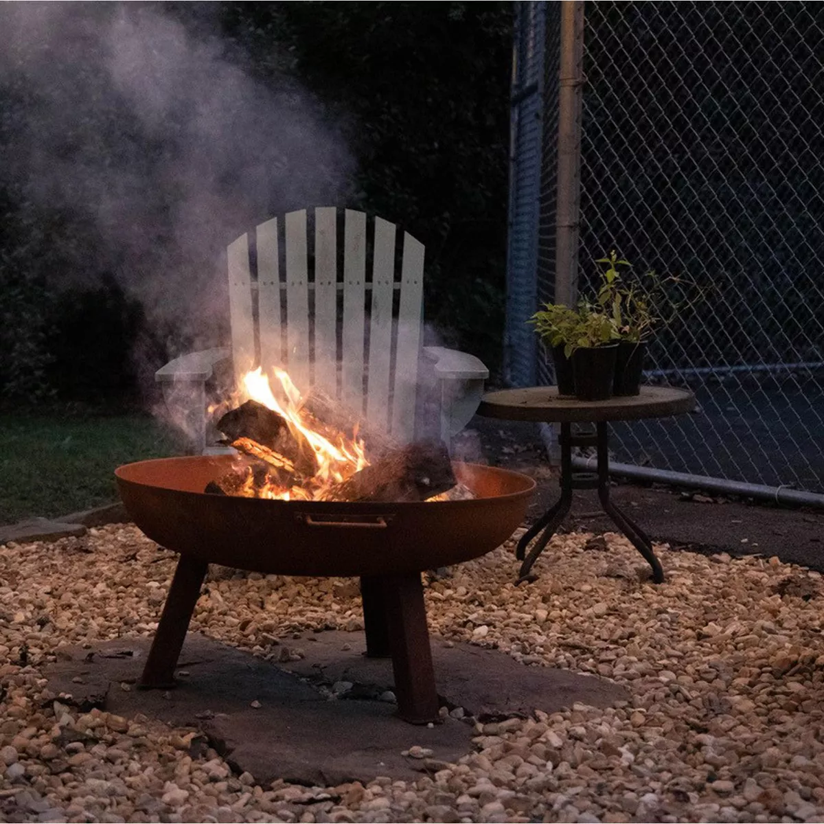 Sunnydaze Outdoor Camping or Backyard Portable Round Cast Iron Rustic Fire Pit Bowl with Handles - 24