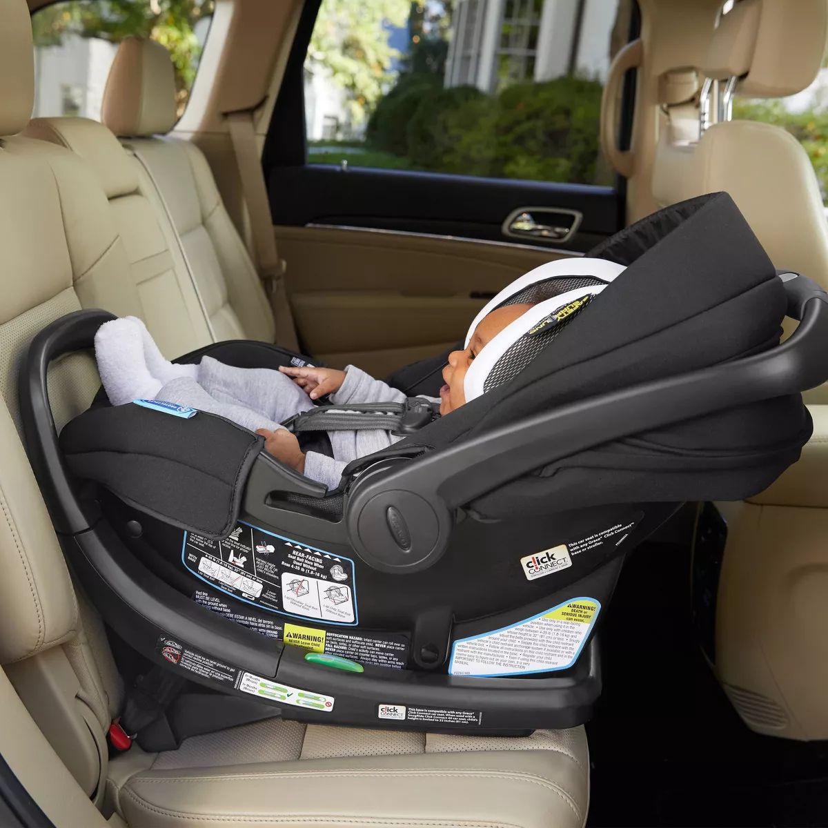 Graco SnugRide SnugFit 35 DLX Infant Car Seat Featuring Safety Surround - Jacks